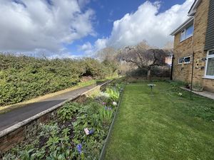 FRONT GARDEN ABUTTING WALKWAY- click for photo gallery